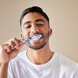 Dentist examining patient's teeth